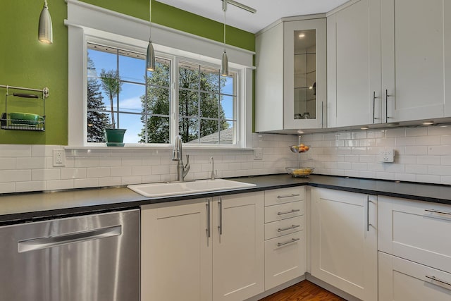 26063 County Road 2, Saint Joseph Twp, MN 56301 - kitchen with stainless steel dishwasher, a sink, backsplash, and plenty of natural light
