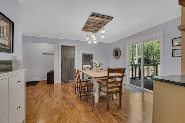 26063 County Road 2, Saint Joseph Twp, MN 56301 - dining room with light wood-style flooring and baseboards