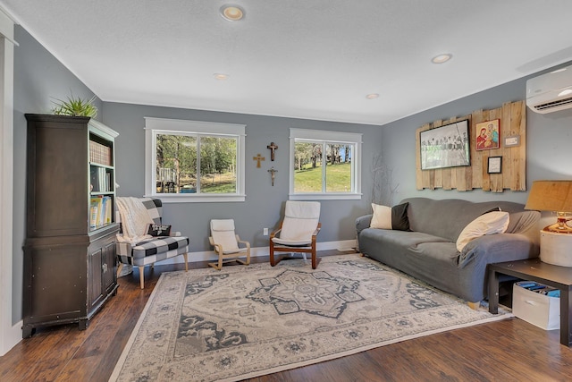 26063 County Road 2, Saint Joseph Twp, MN 56301 - living area with a wall mounted AC, recessed lighting, dark wood finished floors, and baseboards