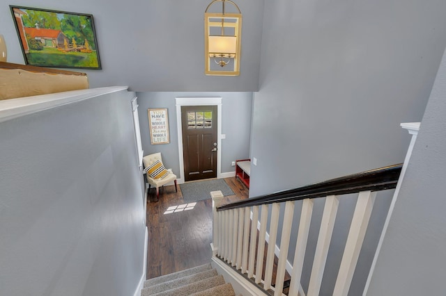 26063 County Road 2, Saint Joseph Twp, MN 56301 - stairs featuring wood finished floors and baseboards