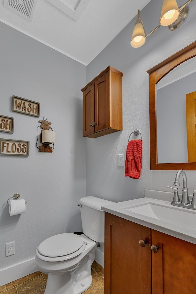 26063 County Road 2, Saint Joseph Twp, MN 56301 - half bathroom with baseboards, toilet, and vanity