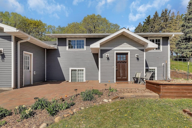 26063 County Road 2, Saint Joseph Twp, MN 56301 - back of property with a yard, a deck, and a patio