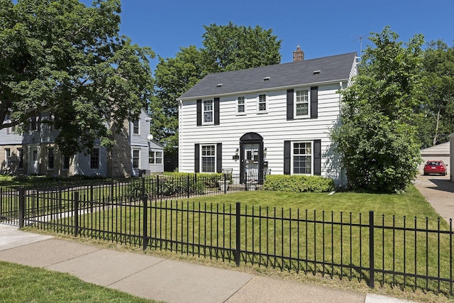 2613 Inglewood Ave S, Saint Louis Park, MN 55416 - colonial house featuring a chimney