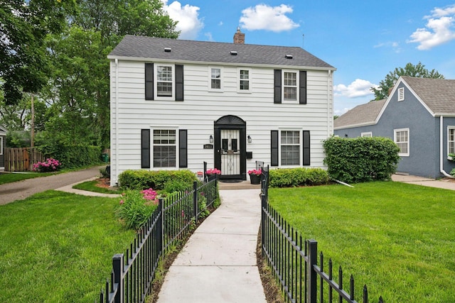 2613 Inglewood Ave S, Saint Louis Park, MN 55416 - colonial inspired home featuring a chimney