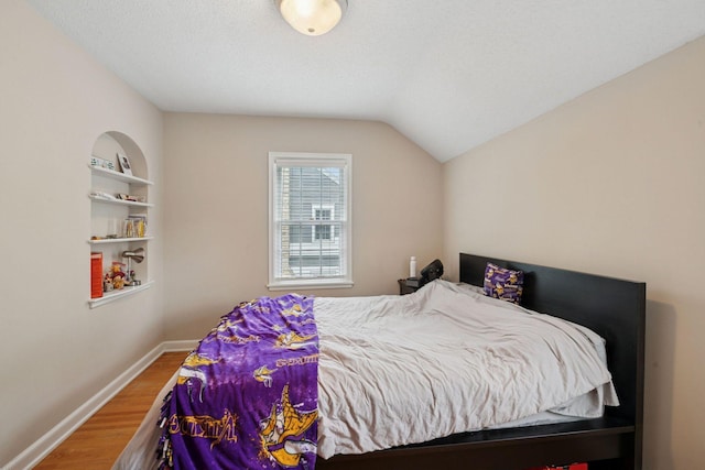 2613 Inglewood Ave S, Saint Louis Park, MN 55416 - bedroom with wood finished floors and vaulted ceiling