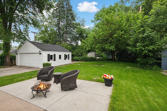2613 Inglewood Ave S, Saint Louis Park, MN 55416 - view of patio / terrace featuring an outdoor fire pit, a detached garage, and an outdoor structure