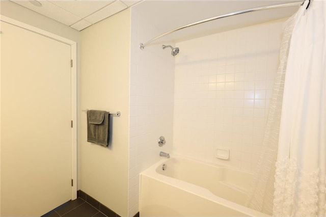 bathroom featuring tile patterned floors and shower / bath combo