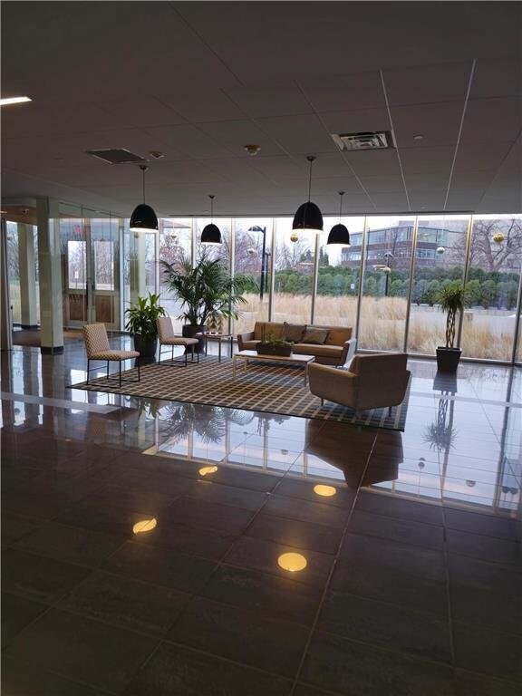 building lobby featuring visible vents