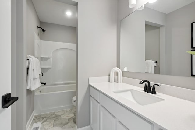 full bathroom featuring visible vents, vanity, toilet, baseboards, and  shower combination