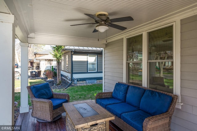 view of patio / terrace with a ceiling fan and outdoor lounge area