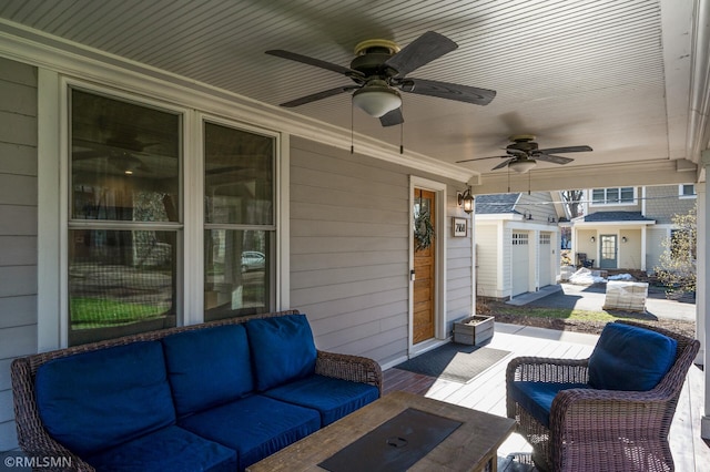 view of patio / terrace with a ceiling fan and outdoor lounge area