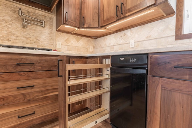 22694 Coney Island Dr, Clitherall, MN 56524 - kitchen with decorative backsplash, beverage cooler, brown cabinets, and light stone counters