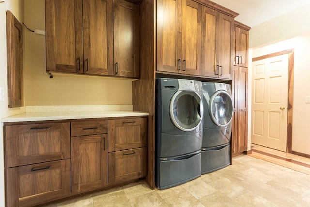 22694 Coney Island Dr, Clitherall, MN 56524 - washroom with cabinet space and separate washer and dryer