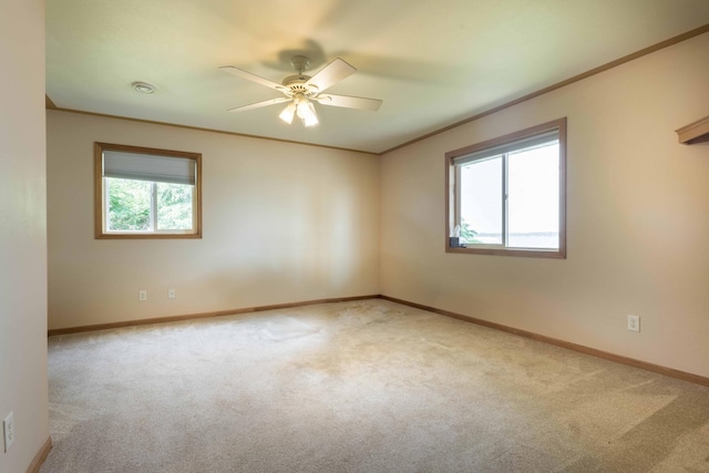22694 Coney Island Dr, Clitherall, MN 56524 - empty room featuring carpet, baseboards, ceiling fan, and ornamental molding