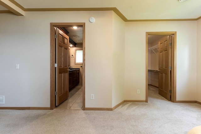 22694 Coney Island Dr, Clitherall, MN 56524 - empty room featuring light colored carpet, a smoke detector, baseboards, and ornamental molding