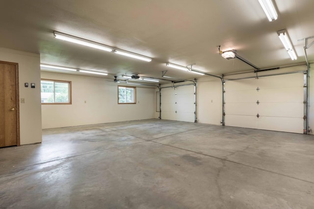 22694 Coney Island Dr, Clitherall, MN 56524 - garage featuring a garage door opener