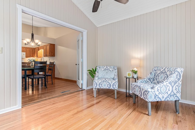 5676 Donegal Dr, Shoreview, MN 55126 - sitting room with light wood-style floors, a chandelier, and a ceiling fan