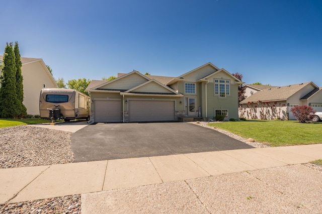 822 Emerson Ave N, Montrose, MN 55363 - view of front of property featuring driveway and an attached garage