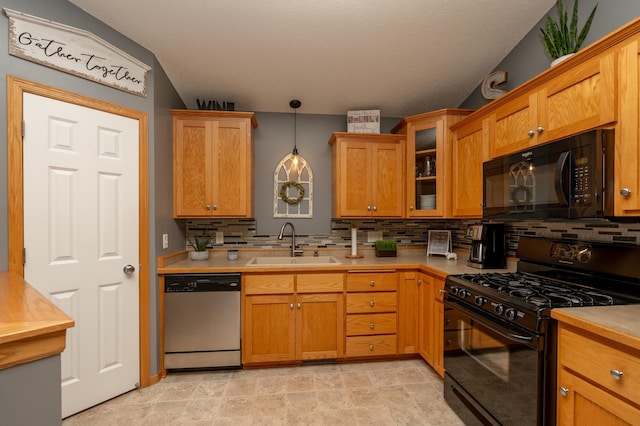 822 Emerson Ave N, Montrose, MN 55363 - kitchen with black appliances, a sink, decorative backsplash, and light countertops