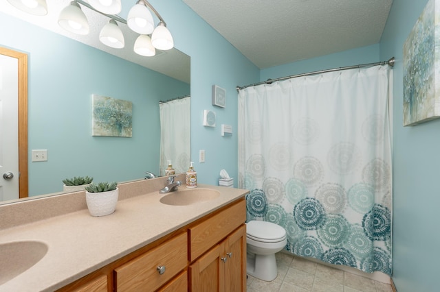 822 Emerson Ave N, Montrose, MN 55363 - full bath with double vanity, toilet, and a textured ceiling