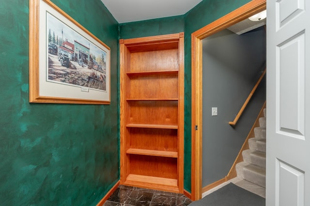 822 Emerson Ave N, Montrose, MN 55363 - stairs with baseboards and marble look tile flooring