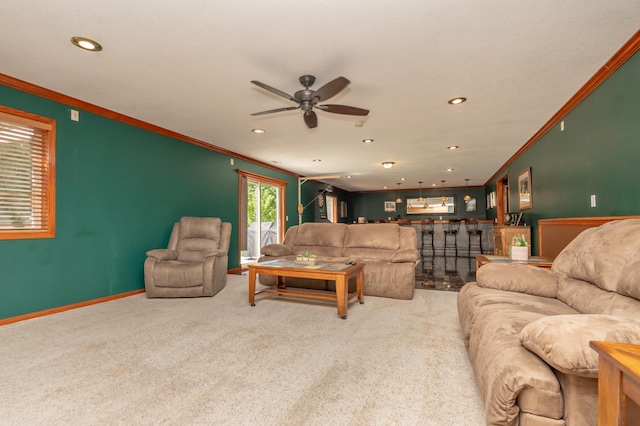 822 Emerson Ave N, Montrose, MN 55363 - living room featuring ornamental molding, ceiling fan, carpet, recessed lighting, and bar area