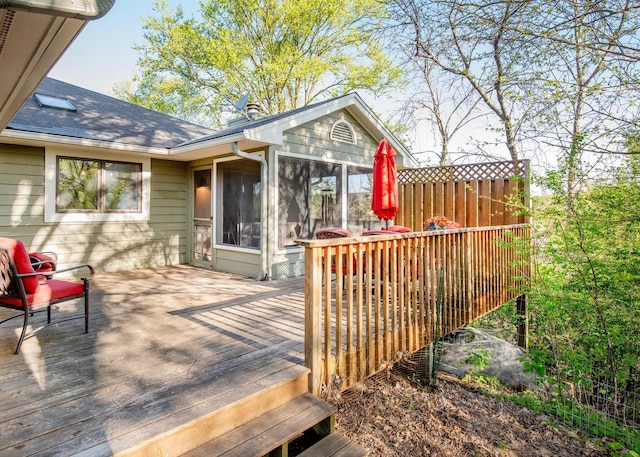 deck with a sunroom