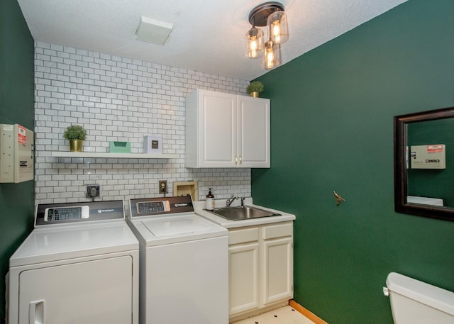 laundry room with independent washer and dryer