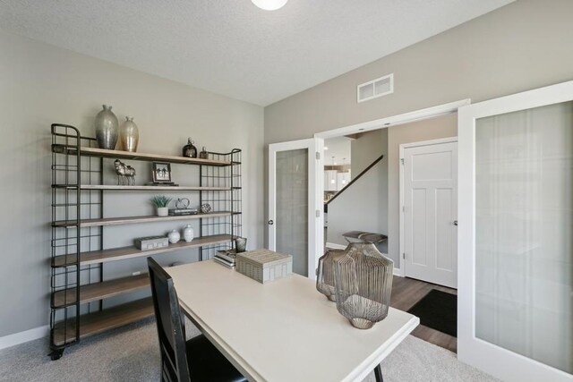 1064 Aster Blvd, Rosemount, MN 55068 - office featuring french doors, baseboards, and dark wood finished floors