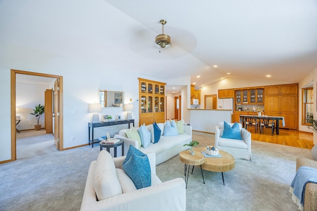 344 Barker St, Hastings, MN 55033 - living area featuring lofted ceiling, light carpet, and a ceiling fan