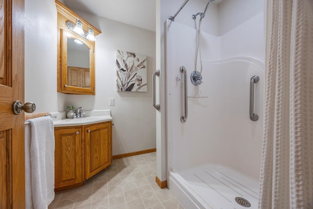 344 Barker St, Hastings, MN 55033 - bathroom featuring a stall shower, vanity, and tile patterned floors