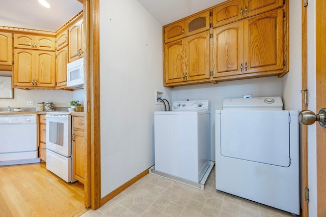 344 Barker St, Hastings, MN 55033 - laundry room with separate washer and dryer and baseboards