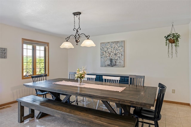 2606 Hulett Ct, Faribault, MN 55021 - dining space with baseboards and light tile patterned floors