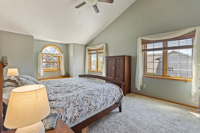 2606 Hulett Ct, Faribault, MN 55021 - bedroom featuring carpet, lofted ceiling, multiple windows, baseboards, and a ceiling fan