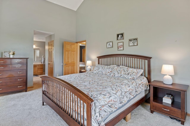 2606 Hulett Ct, Faribault, MN 55021 - bedroom with carpet flooring, high vaulted ceiling, and ensuite bathroom