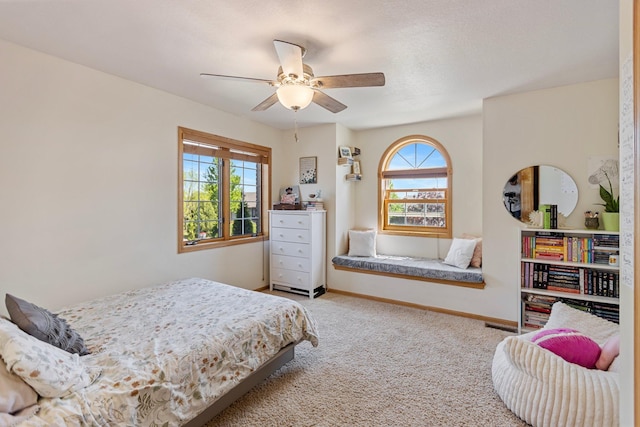 2606 Hulett Ct, Faribault, MN 55021 - bedroom with carpet, baseboards, and a ceiling fan