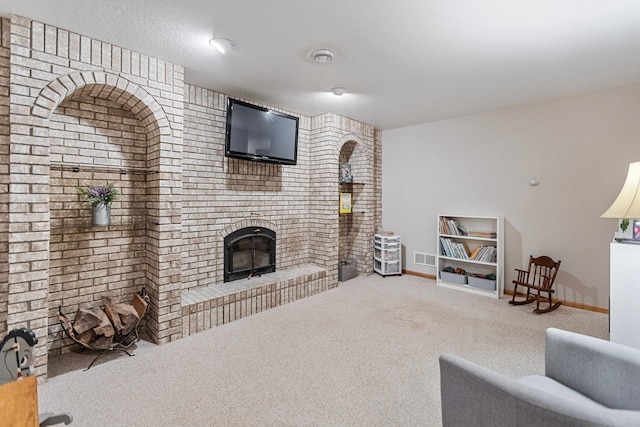 2606 Hulett Ct, Faribault, MN 55021 - carpeted living room featuring a brick fireplace and baseboards