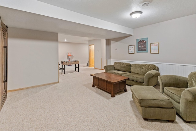 2606 Hulett Ct, Faribault, MN 55021 - living room featuring light colored carpet and baseboards