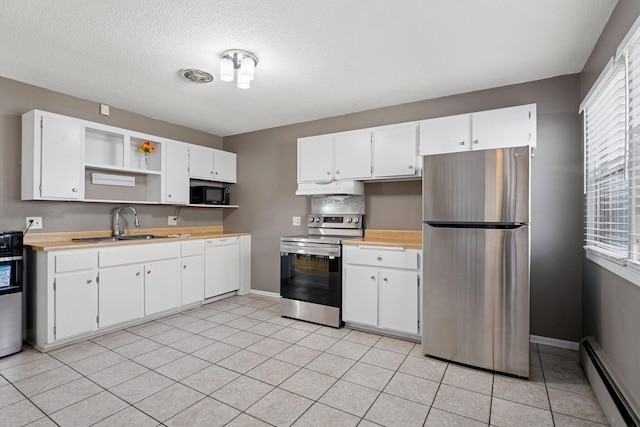 kitchen with baseboard heating, open shelves, a sink, under cabinet range hood, and stainless steel appliances
