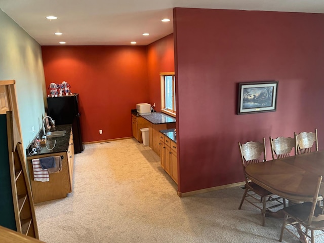 79317 355th St, Clinton, MN 56225 - dining area with light colored carpet, recessed lighting, and baseboards