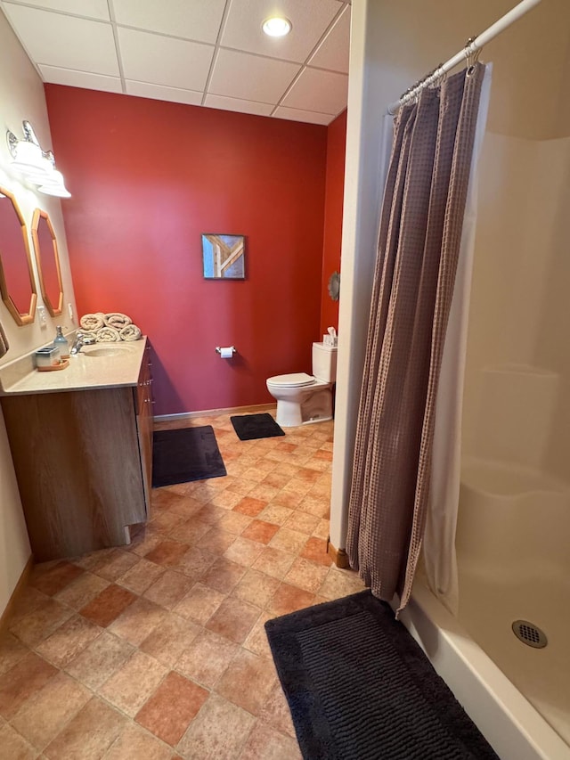 79317 355th St, Clinton, MN 56225 - bathroom with a shower stall, toilet, baseboards, vanity, and stone finish floors