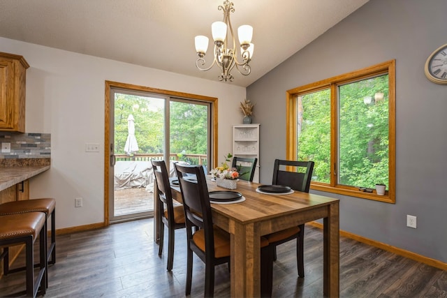 2686 56th Ave, Princeton, MN 55371 - dining room featuring lofted ceiling, healthy amount of natural light, a chandelier, and dark wood-style flooring
