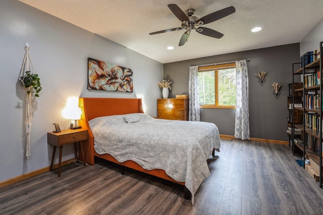 2686 56th Ave, Princeton, MN 55371 - bedroom with wood finished floors, a textured ceiling, baseboards, recessed lighting, and a ceiling fan