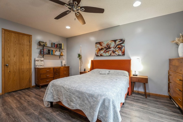 2686 56th Ave, Princeton, MN 55371 - bedroom with wood finished floors, baseboards, recessed lighting, a ceiling fan, and a textured ceiling