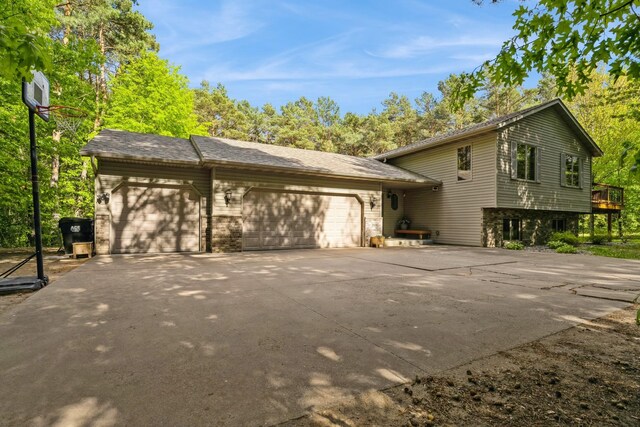 2686 56th Ave, Princeton, MN 55371 - view of home's exterior with a garage and concrete driveway