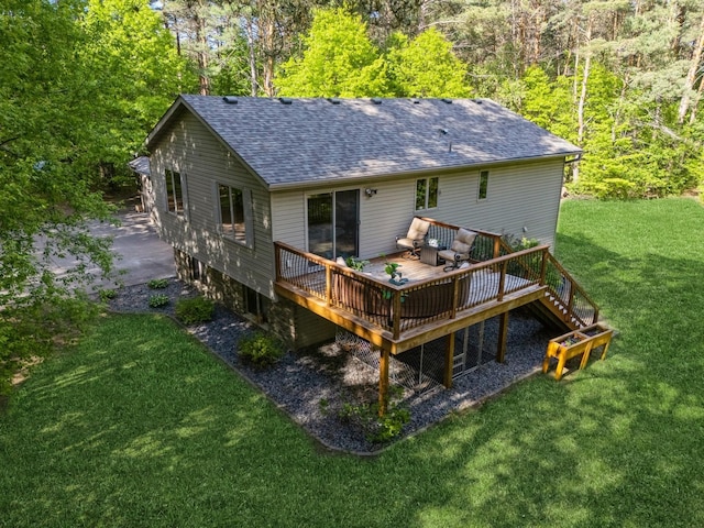 2686 56th Ave, Princeton, MN 55371 - back of house with a shingled roof, a wooden deck, and a lawn