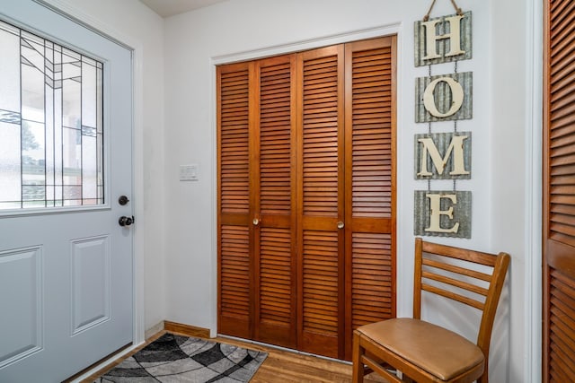 118 Golf Ter, Crookston, MN 56716 - entryway with baseboards and wood finished floors