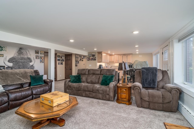 118 Golf Ter, Crookston, MN 56716 - living area with recessed lighting, light colored carpet, plenty of natural light, and a baseboard radiator