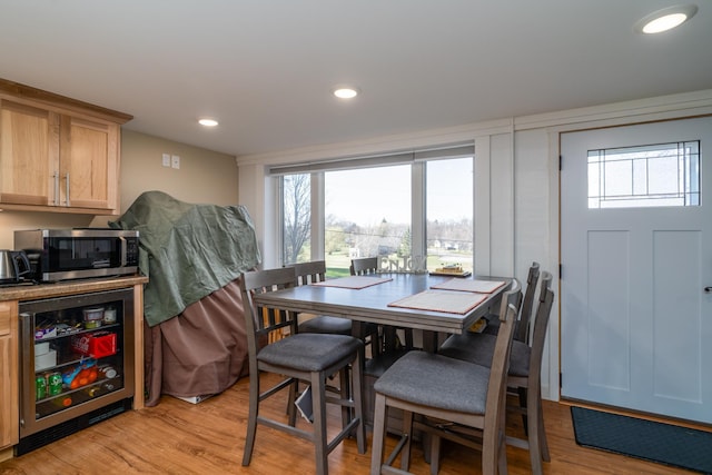 118 Golf Ter, Crookston, MN 56716 - dining area featuring wine cooler, recessed lighting, and light wood-style flooring