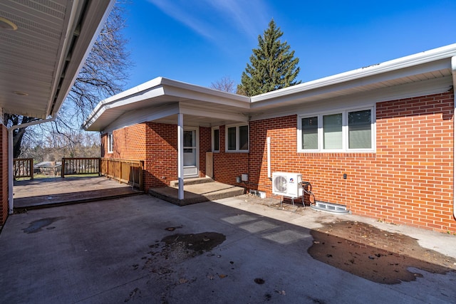 118 Golf Ter, Crookston, MN 56716 - exterior space with ac unit, a deck, and concrete driveway